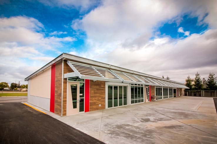 modular school buildings for STEAM leaning at middle school with folding glass walls
